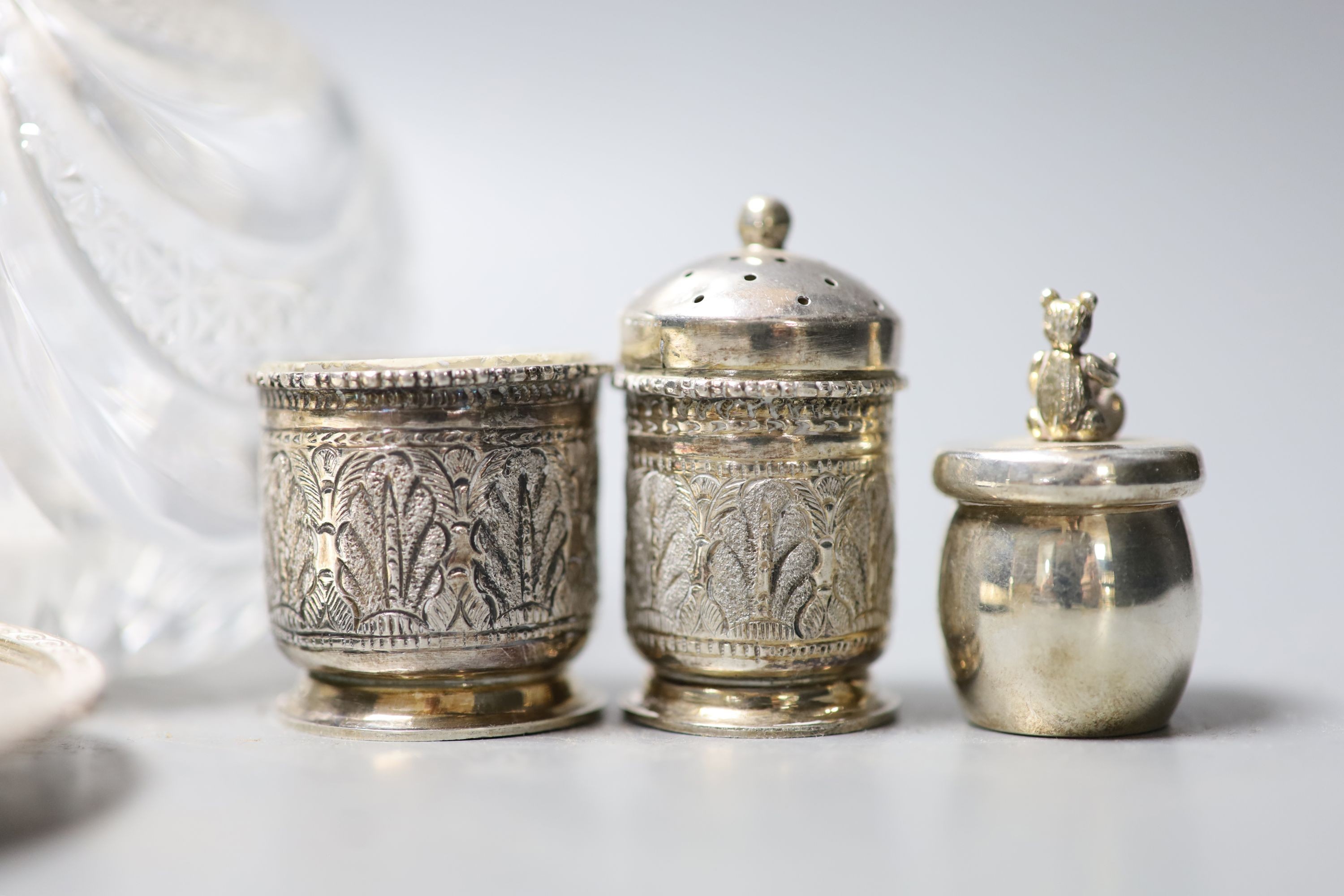 Mixed small silver including pair of silver dishes with glass liners, a silver hip flask, silver cream jug, scent bottles etc.